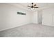 Bright bedroom with carpet flooring and ceiling fan at 740 Kingfish Ct, Punta Gorda, FL 33950