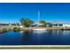 Scenic canal views with sailboat and waterfront homes at 740 Kingfish Ct, Punta Gorda, FL 33950