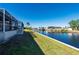 Beautiful canal front property with lush landscaping at 740 Kingfish Ct, Punta Gorda, FL 33950