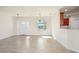 Light-filled dining area with tile floors and a view from a large window at 740 Kingfish Ct, Punta Gorda, FL 33950