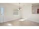 Simple dining room with light walls and tiled flooring at 740 Kingfish Ct, Punta Gorda, FL 33950