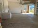 Spacious garage with open garage door and interior access at 740 Kingfish Ct, Punta Gorda, FL 33950
