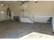 Garage with interior access and storage shelving at 740 Kingfish Ct, Punta Gorda, FL 33950