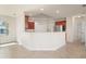 Modern kitchen with wood cabinets, granite countertops, and stainless steel appliances at 740 Kingfish Ct, Punta Gorda, FL 33950