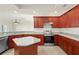 Modern kitchen with stainless steel appliances and granite countertops at 740 Kingfish Ct, Punta Gorda, FL 33950