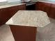 Close-up view of kitchen island with granite countertop at 740 Kingfish Ct, Punta Gorda, FL 33950