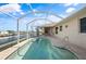 Enjoy this relaxing screened pool and spa with water views at 740 Kingfish Ct, Punta Gorda, FL 33950