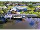 Single story home with private dock and canal access in a residential neighborhood at 824 E 6Th St, Englewood, FL 34223