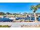 Private dock with boat lift and steps leading to the water at 824 E 6Th St, Englewood, FL 34223