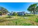 Single story home with landscaped yard and canal views at 824 E 6Th St, Englewood, FL 34223