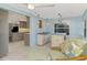 Bright kitchen features updated cabinetry and countertops at 824 E 6Th St, Englewood, FL 34223
