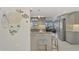 Updated kitchen boasting granite counters, gray cabinets, and breakfast bar at 824 E 6Th St, Englewood, FL 34223