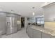 Modern kitchen with stainless steel appliances and granite countertops at 824 E 6Th St, Englewood, FL 34223