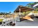 Covered patio with seating area overlooking the canal at 824 E 6Th St, Englewood, FL 34223