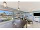 Sunroom with water views and access to back patio at 824 E 6Th St, Englewood, FL 34223