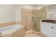 Bathroom with a large shower and soaking tub at 98 Vivante Blvd # 209, Punta Gorda, FL 33950