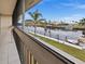 Scenic view of the canal with boats and lush landscaping from balcony at 1080 Bal Harbor Blvd # 6D, Punta Gorda, FL 33950