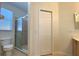 Bathroom with shower stall and linen closet at 1436 Hedgewood Cir, North Port, FL 34288