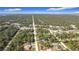Wide aerial view of a neighborhood and waterfront at 14454 Nw Chamberlain Blvd, Port Charlotte, FL 33953