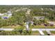 Aerial view of property showing home, driveway and lot size at 14454 Nw Chamberlain Blvd, Port Charlotte, FL 33953