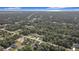 Aerial view of a neighborhood showcasing various houses at 14454 Nw Chamberlain Blvd, Port Charlotte, FL 33953