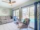 Relaxing view of the pool from the living room at 14454 Nw Chamberlain Blvd, Port Charlotte, FL 33953