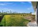 Backyard with seating area and view of neighborhood at 16689 Expedition Ct, Punta Gorda, FL 33982