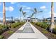 Walkway leading to community clubhouse and amenities at 17336 Sandpearl Rd, Venice, FL 34293