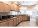 Modern kitchen with granite countertops and stainless steel appliances at 18614 Kerrville Cir, Port Charlotte, FL 33948