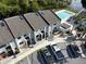 Aerial view of townhouses with parking and pool at 2000 Forrest Nelson Blvd # C8, Port Charlotte, FL 33952