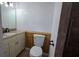Clean bathroom with vanity, toilet and tiled shower at 2000 Forrest Nelson Blvd # C8, Port Charlotte, FL 33952
