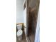 Bathroom with shower, toilet and wood-paneled walls at 2000 Forrest Nelson Blvd # C8, Port Charlotte, FL 33952