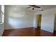 Bedroom with hardwood floors and walk-in closet at 2000 Forrest Nelson Blvd # C8, Port Charlotte, FL 33952