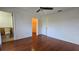 Spacious bedroom with hardwood floors and walk-in closet at 2000 Forrest Nelson Blvd # C8, Port Charlotte, FL 33952