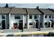 Front view of townhouses with gray roofs and white walls at 2000 Forrest Nelson Blvd # C8, Port Charlotte, FL 33952