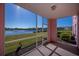 Relaxing screened lanai overlooking peaceful lake views at 2120 Heron Lake Dr # 107, Punta Gorda, FL 33983