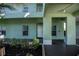 Condo building exterior, unit 104 entrance at 2160 Heron Lake Dr # 104, Port Charlotte, FL 33983