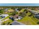 Aerial view of single-Gathering home with pool and solar panels at 2168 Calcutta, Punta Gorda, FL 33983