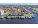 Aerial view of waterfront community with boat docks and stunning canal views at 240 Lewis Cir # 29, Punta Gorda, FL 33950