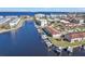 Gorgeous aerial of waterfront condos with private boat docks and scenic bay views at 240 Lewis Cir # 29, Punta Gorda, FL 33950