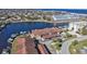 Scenic aerial view of waterfront condos with boat docks and a neighboring waterfront community at 240 Lewis Cir # 29, Punta Gorda, FL 33950