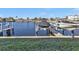 View of the community boat lift and dock at 240 Lewis Cir # 29, Punta Gorda, FL 33950