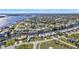 Aerial view of waterfront homes and community at 27409 Voyageur Dr, Punta Gorda, FL 33983