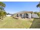 Large backyard with grassy area and privacy fence at 3065 Clifford St, Punta Gorda, FL 33980