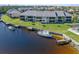 Aerial view of waterfront property, showing boat slips and community at 3256 White Ibis Ct # 14 A, Punta Gorda, FL 33950