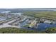 Aerial view of waterfront home with canal access at 4195 Surfside Ct, Port Charlotte, FL 33948