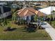 Stunning aerial view of waterfront property with mature landscaping at 546 Macedonia Dr, Punta Gorda, FL 33950