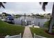 Brick pathway to the canal with boat dock at 546 Macedonia Dr, Punta Gorda, FL 33950