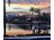 Scenic waterfront view with beautiful sunset colors and boats docked at 546 Macedonia Dr, Punta Gorda, FL 33950