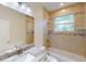 Clean bathroom with granite vanity and a shower/tub combo at 5986 Bobolink St, North Port, FL 34291